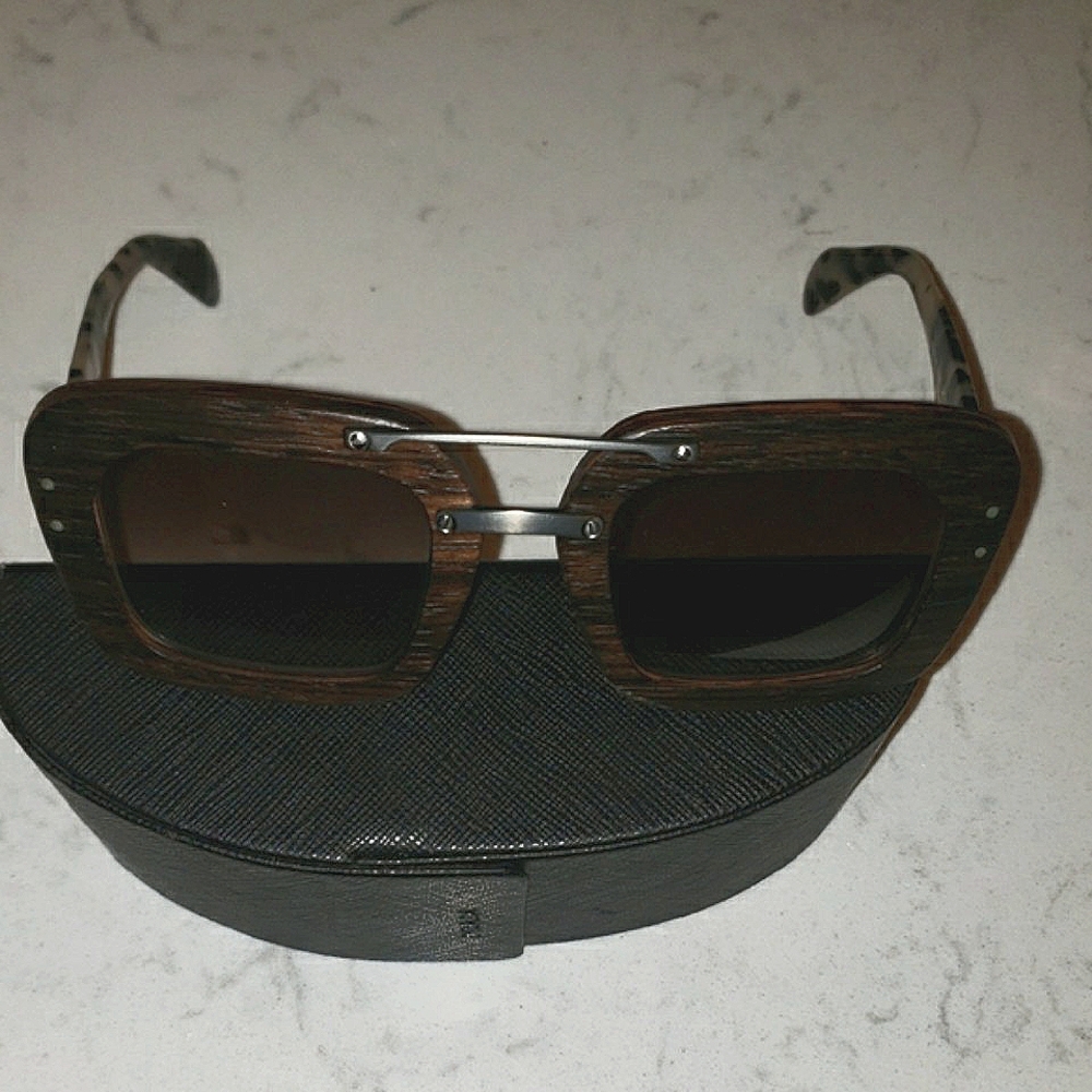 Prada Women's/Unisex Brown Sunglasses. Wood Like Frame.